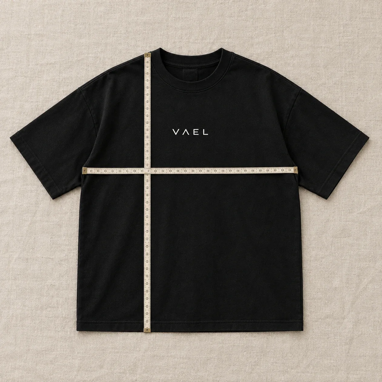 Camiseta extendida con cinta métrica en el pecho y el largo